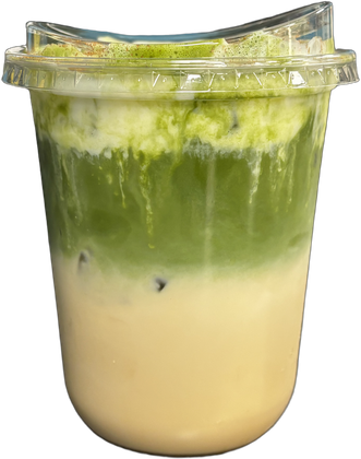 Tall clear cup of pale banana-cream matcha with a dark green matcha layer across the top