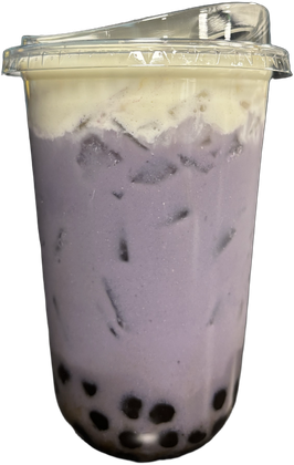 Tall clear cup of lavender taro milk tea capped with white coconut cold foam, tapioca at the bottom
